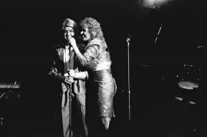 Mike Nolan and Cheryl Baker of Bucks Fizz seen here performing on stage at Leas Cliff