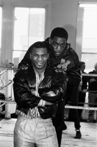 01103 Prints: Mike Tyson meets Frank Bruno. Tysons in London to see Frank Bruno against James