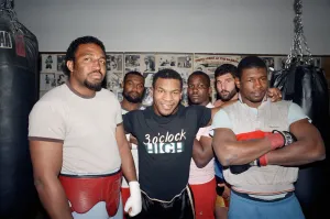 Mike Tyson with sparring partners ahead of his bout with James Bonecrusher Smith