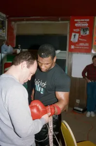 Mike Tyson in his training camp with Kevin Rooney ahead of his bout with James