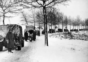 Ardennes Prints: Miles of transport forge ahead through the snow covered grounds of the Ardennes salient