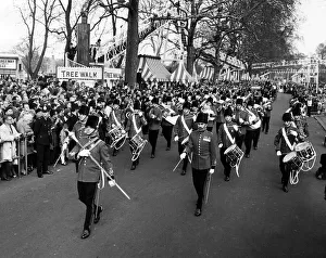 00004 Prints: A military band leads the Battersea Easter Parade of 1971 as crowds gather to watch