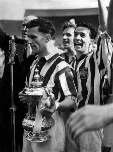 Millard, The West Bromwich Captain Holding Cup after presentation