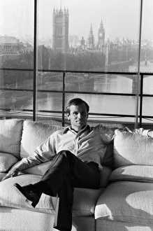 01364 Prints: Millionaire author Jeffrey Archer pictured in his penthouse Embankment flat overlooking