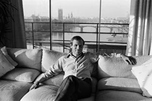 01364 Prints: Millionaire author Jeffrey Archer pictured in his penthouse Embankment flat overlooking