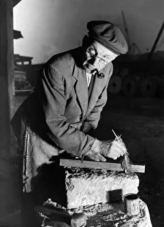 Stone Prints: Millstone making, before cutting the emery stone the line is marked with a feather dipped