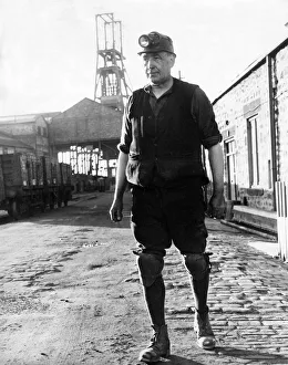 00051 Prints: A miner ready to start his shift wearing traditional clothes