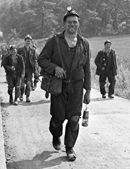 00959 Prints: Miners of the Bullclliffe Colliery near Wakefield seen here coming off shift