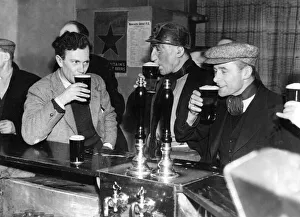 00051 Prints: These miners relaxing after a hard day at work in their local working mens club