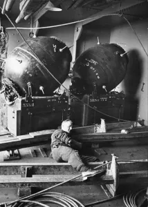 Mine Prints: Mines that will be laid to trap enemy ships. A hard working man takes a well earned