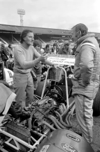 Mini Grand Prix: White City Stadium: Graham Hill sorting out a few performance problems