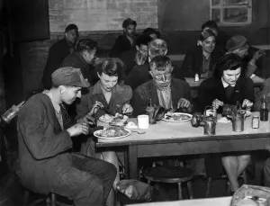 00025 Prints: Mining coal miners. Miners straight from the coal sitting down with women folk of