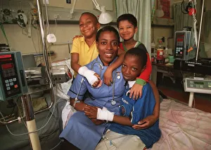 Pob1999 Prints: Mirror Pride of Britain Awards 1999 Sister Yvonne John with patients James