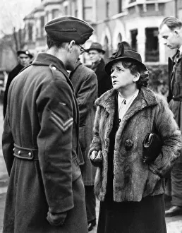 Grief Prints: Miss Ellen Wilkinson gives her sympathies to Corporal Biddle whose five year old twins