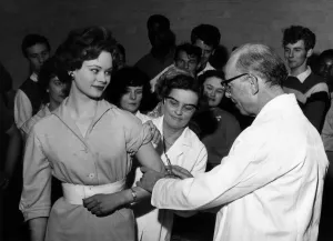 Miss England 1959 Miss Pamela Searle receives her polio vaccination in public to