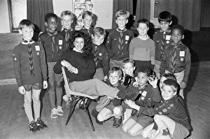 Fundraising Prints: Miss Examiner, Maureen Wigton, has olled pack of cub scouts to help her raise cash for
