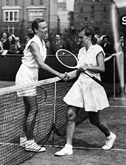 Miss Gussie Moran (left) being congratulated June 1949 after her win