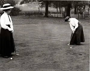 00135 Prints: Miss N Bock and Miss M Shepton playing at the Lady Golf Competition at Timperley