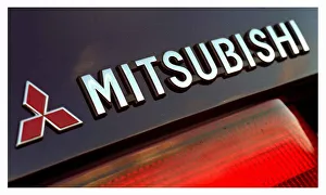Badges Prints: Mitsubishi Carisma car October 1998 tail lights logo