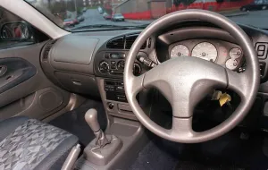 Vehicles And Transport Prints: Mitsubishi Colt car December 1998 used car steering wheel