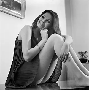Model and actress Suzy Kidd poses for pictures modelling British fashions in her Holland