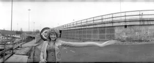 Photography Prints: Model Angela Jay pictured here near her home in Hendon trying to stop a bus