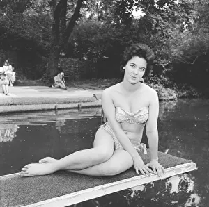Diving Board Prints: Model Barara Joyce seen here at the local lido modelling the latest beach wear
