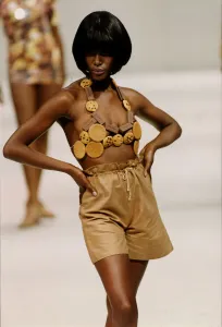 Biscuits Prints: Model on the cat walk wearing a bra made from biscuits in the Red or Dead fashion show