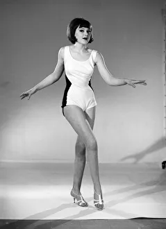 Model, Debbie Attwood, poses in the latest beachwear fashion, Studio Pix, 1963