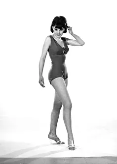00845 Prints: Model, Debbie Attwood, poses in the latest beachwear fashion, Studio Pix, 1963