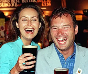 Model Eileen Catterson and TV Presenter John Leslie having some fun at the launch of