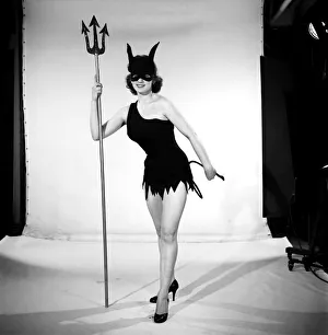 Model Jacqueline Durran dressed as a She Devil. June 1957