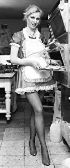 Model Janet Slaven seen here helping putting her mince pies into the oven December 1982