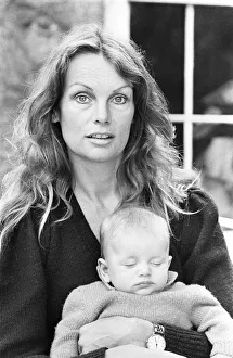 Former model Jean Shrimpton, 36, pictured with baby son Thaddeus, aged 3 months