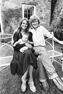 Former model Jean Shrimpton, 36, pictured with husband Michael Cox and baby son Thaddeus