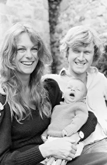 Former model Jean Shrimpton, 36, pictured with husband Michael Cox and baby son Thaddeus