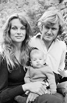 Former model Jean Shrimpton, 36, pictured with husband Michael Cox and baby son Thaddeus