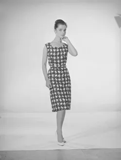 00121 Prints: Model Jennifer Goddard. Young woman in houndstooth dress