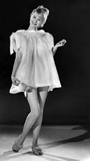 Nightwear Prints: Model Jennifer Wilson poses weasring afur collared nightie, underwear and sandals