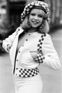 Model Jo Howard pictured wearing Oxford bags and battle blouse - Ready To Wear fashions