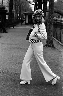Model Jo Howard pictured wearing Oxford bags and battle blouse - Ready To Wear fashions