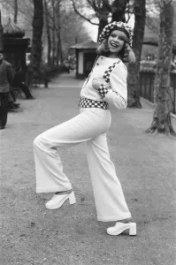 Model Jo Howard pictured wearing Oxford bags and battle blouse - Ready To Wear fashions