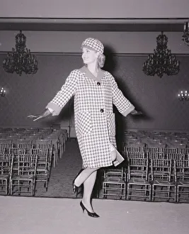 Model Judith Morgan November 1963 Wearing a checked design coat