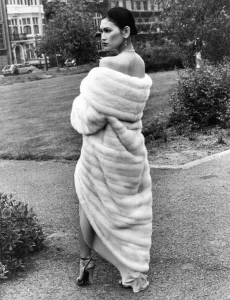 00035 Prints: Model Julie wearing a ravishing decolte tulip shaped evening coat in white saga mink