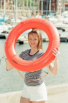 Model, Kelly, wearing Maritime inspired clothing at Liverpool Marina, Merseyside