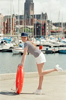 Model, Kelly, wearing Maritime inspired clothing at Liverpool Marina, Merseyside