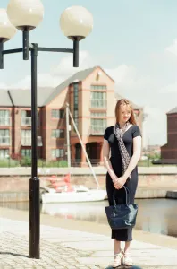 00954 Prints: Model, Kelly, wearing Maritime inspired clothing at Liverpool Marina, Merseyside