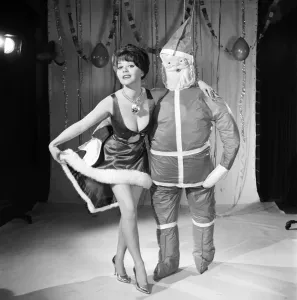 Model Kim Tracy seen here dressed for the office Christmas Party. 1960 E479-013