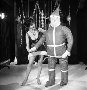 Model Kim Tracy seen here dressed for the office Christmas Party. 1960 E479-017