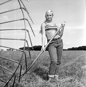 Model Maja Hafernik seen here working on the farm. 1965 E504-012